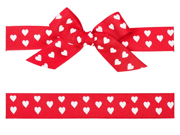 Red bow with hearts and ribbon — Stock Photo, Image