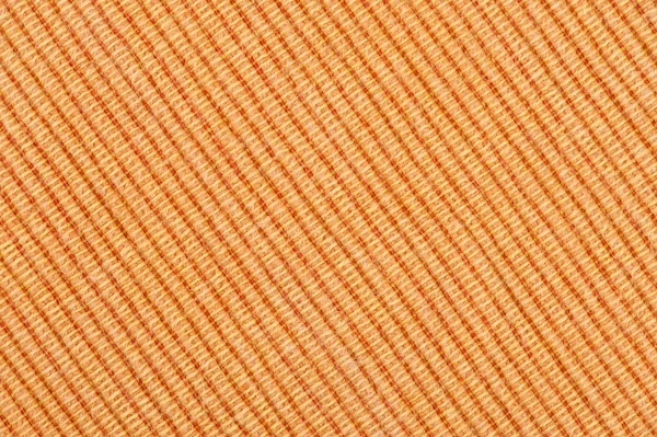 オレンジ色の縞模様のファブリックの背景 — ストック写真