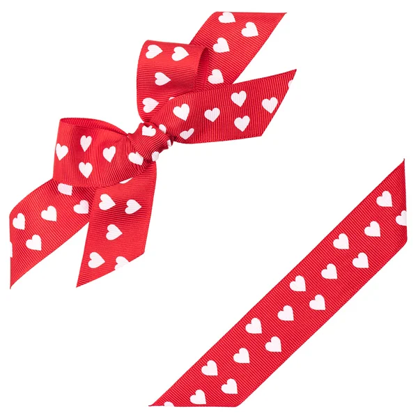 Red bow with hearts and ribbon — Stock Photo, Image