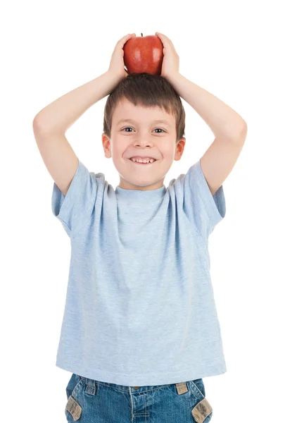 Boy with apple on his head — Stock Photo, Image