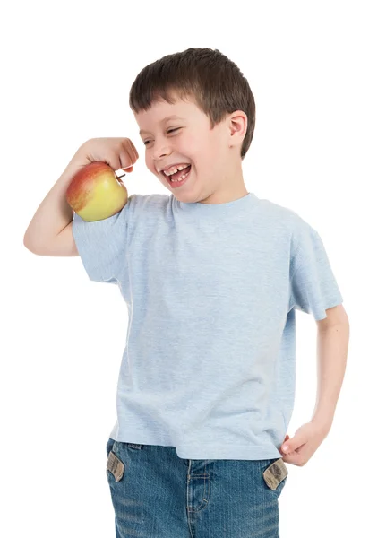 Boy with apple show biceps — Stock Photo, Image