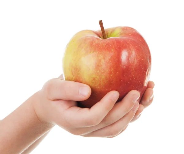 Red apple in child hands — Stock Photo, Image