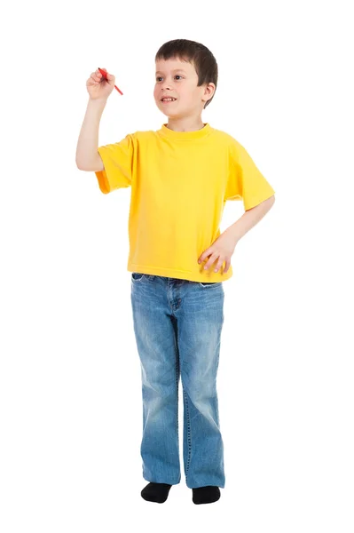 Junge im gelben T-Shirt schreibt Marker — Stockfoto