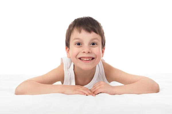 Niño alegre en la cama —  Fotos de Stock