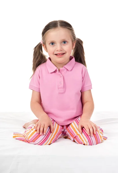 Cheerful girl in bed — Stock Photo, Image