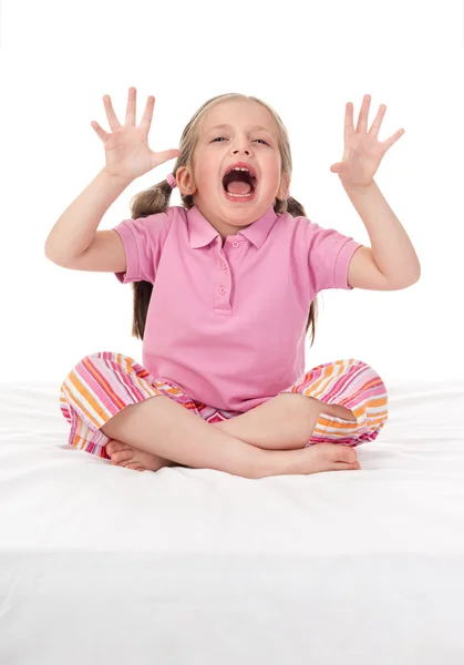 Menina alegre na cama — Fotografia de Stock