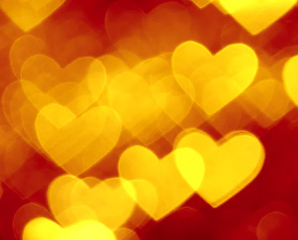 Red and golden hearts boke background — Stock Photo, Image