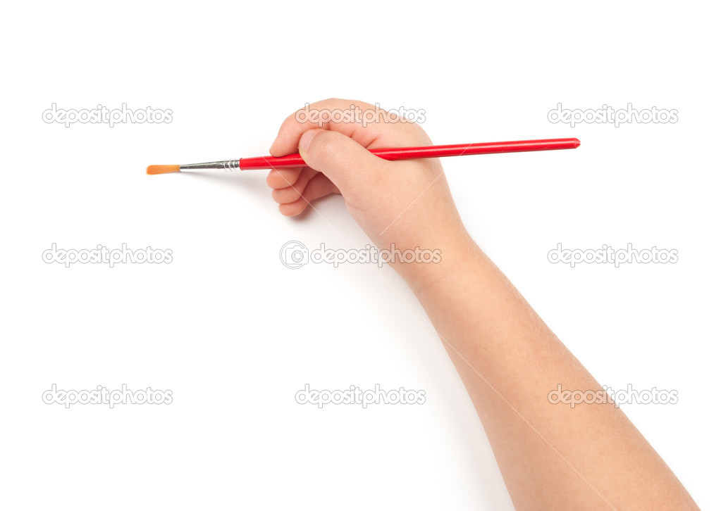 paintbrush in child hand