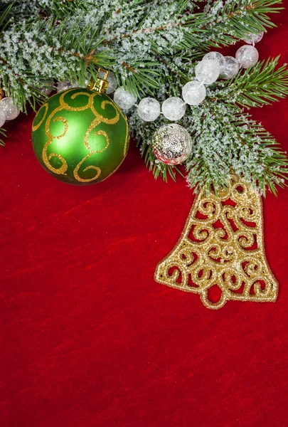 Christmas decoration on red — Stock Photo, Image