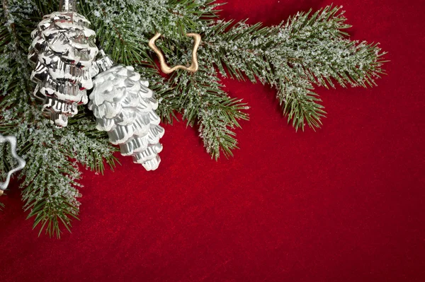 Christmas decoration on red — Stock Photo, Image