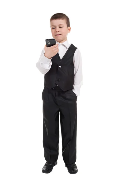 Хлопчик у костюмі на телефон — стокове фото