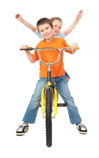 Boy and girl on bicycle isolated on white — Stock Photo, Image