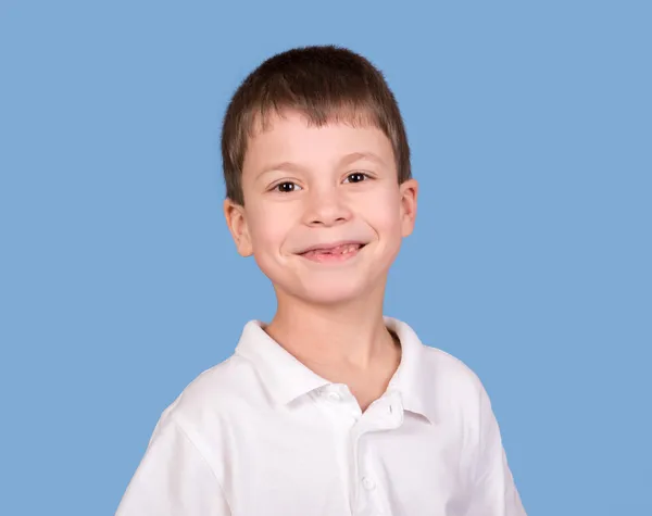 Boy portrait in white shirt on blue — Stock Photo, Image