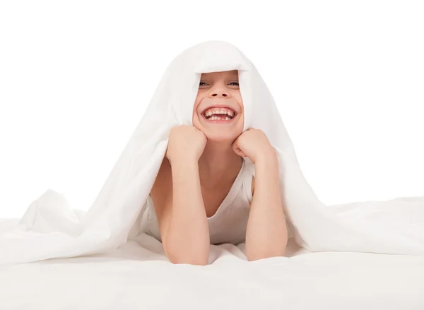 Child in white bed — Stock Photo, Image
