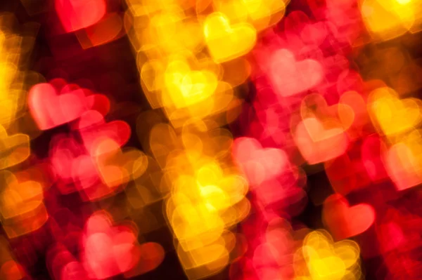 Красный цвет сердца на фоне праздника — стоковое фото