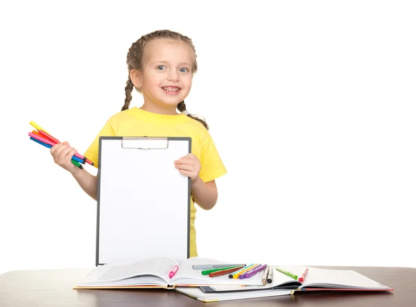 Mädchen mit Klemmbrett und Büchern — Stockfoto