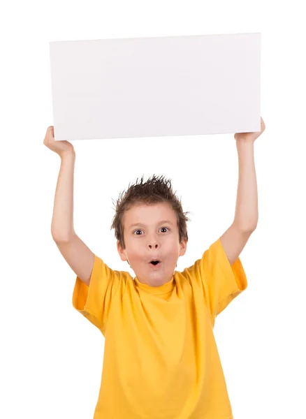 Lycklig pojke stående med gåva på vit — Stockfoto