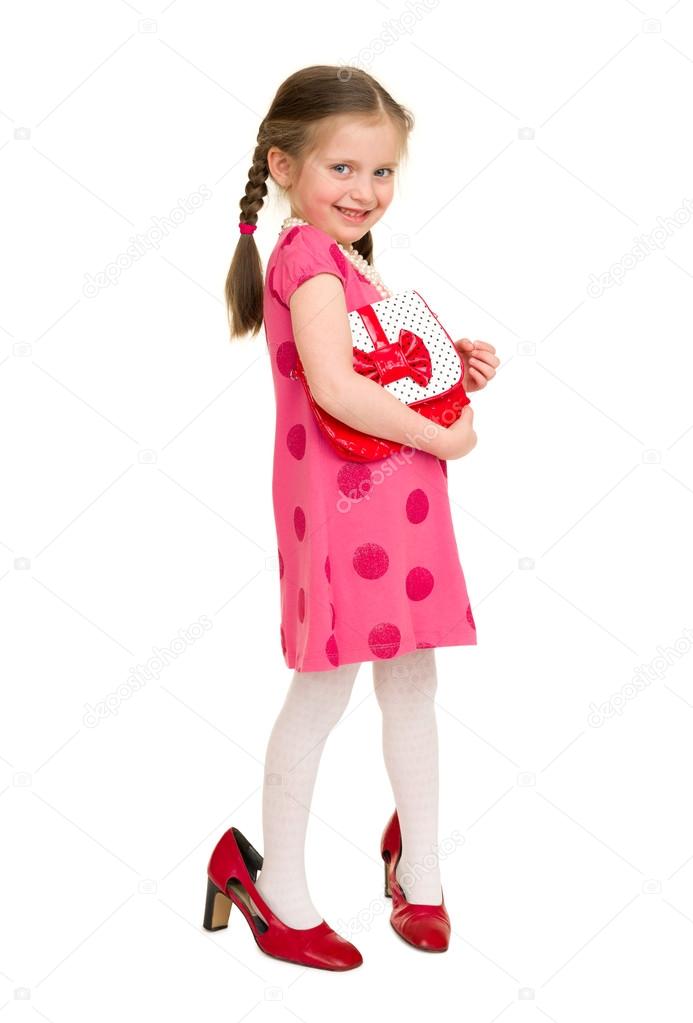 girl in a red dress on white