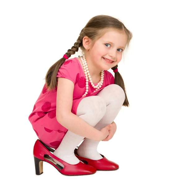 Girl in a red dress on white — Stock Photo, Image