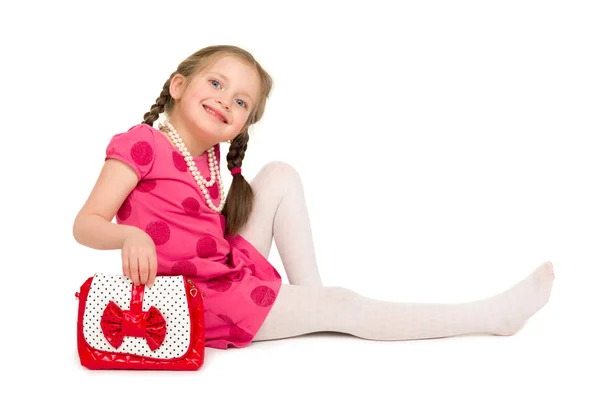 Girl in a red dress on white — Stock Photo, Image