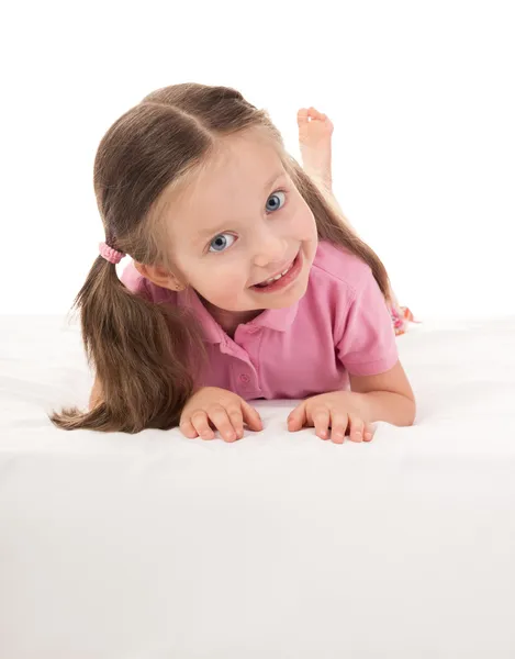 Girl in white bed — Stock Photo, Image