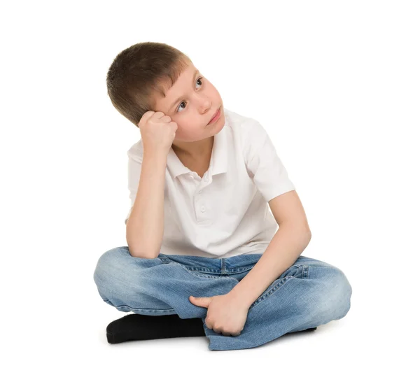 Niño meditativo en blanco — Foto de Stock