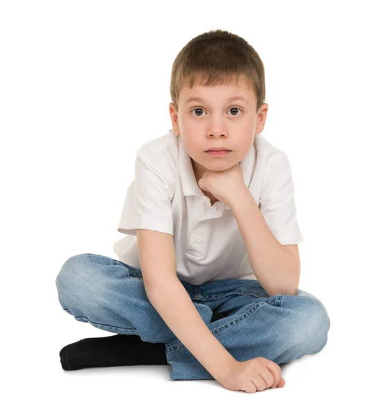 Niño meditativo en blanco — Foto de Stock