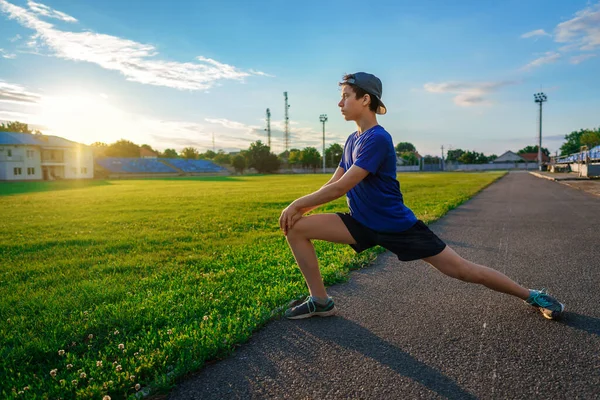 Teen Boy Boy Does Physical Exercises Stadium Track Soccer Field — Stock Photo, Image