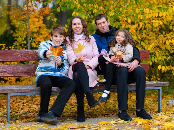 Portrait Happy Family Autumn Park People Sitting Bench Posing Background — Stock Photo, Image