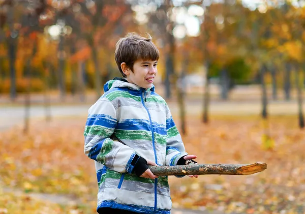 Boy Walks Path Autumn Park Happy Child Playing Twig Laughing — Stock Photo, Image
