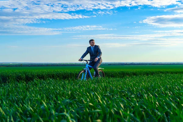 Business Concept Businessman Rides Bicycle Green Grass Field Dressed Business — Stock Photo, Image