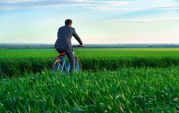 One Businessman Red Folder Reports Documents Rides Bicycle Green Grass — Stock Photo, Image