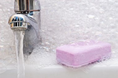 soap and sink in foam clipart