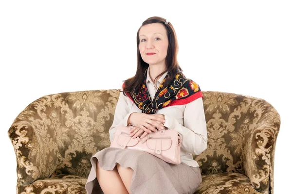 Woman on vintage couch — Stock Photo, Image