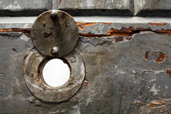 Hole in jail door — Stock Photo, Image