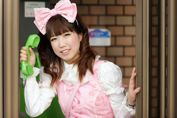 Japanese lolita cosplay shouting in public phone — Stock Photo, Image