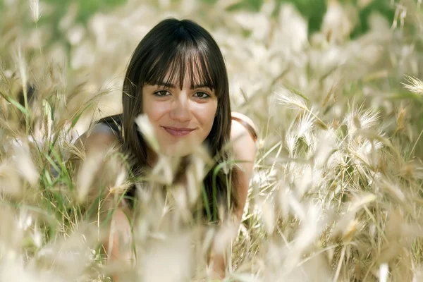 Girl in summer meadow — Stock Photo, Image