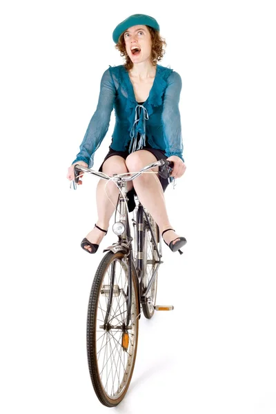 Funny girl on bicycle — Stock Photo, Image