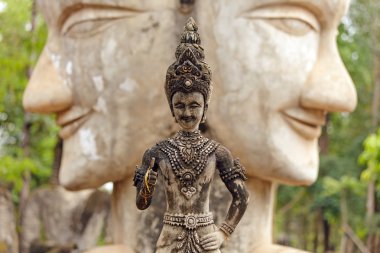 stone buddhist statue in thailand clipart