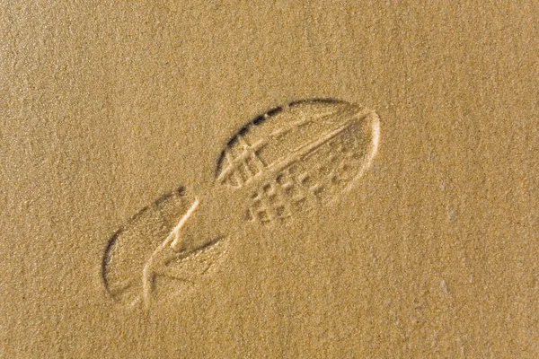 Shoeprint på sand — Stockfoto