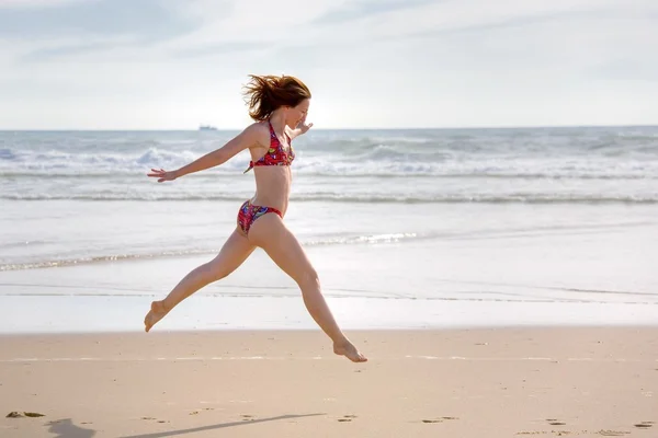 Jumping woman — Stock Photo, Image