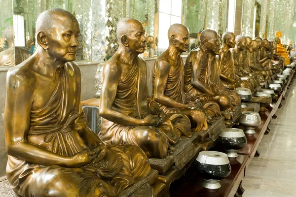 Arany szerzetes szobrok — Stock Fotó