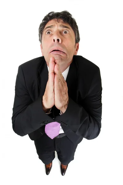 Desperate businessman praying — Stock Photo, Image