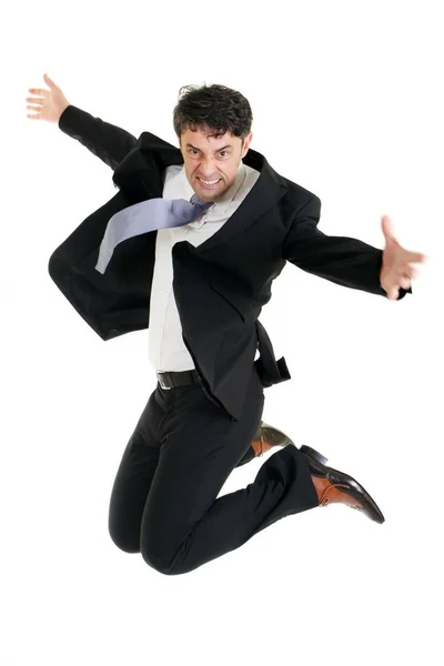 Agile businessman leaping in the air Stock Picture