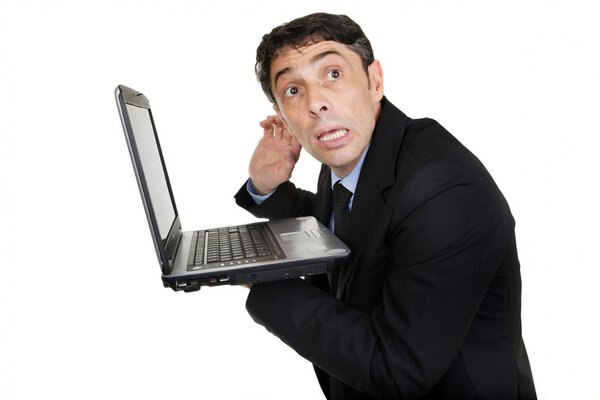 Businessman listening to computer