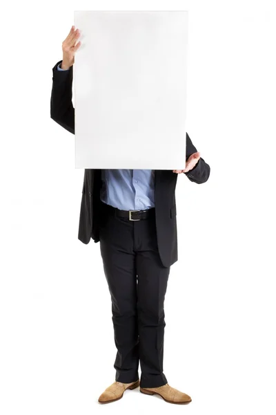 Empresário segurando um sinal em branco — Fotografia de Stock