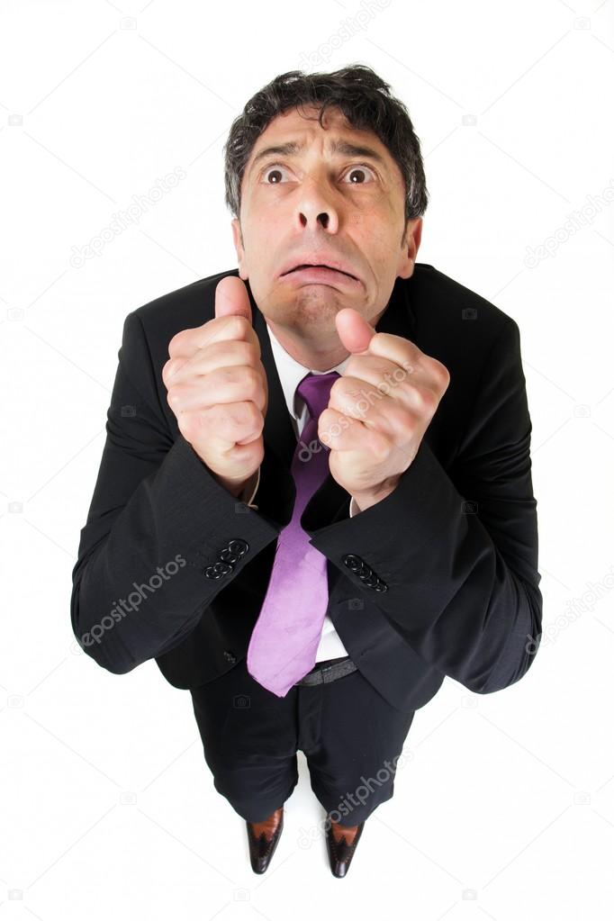 Businessman with a scared fearful expression