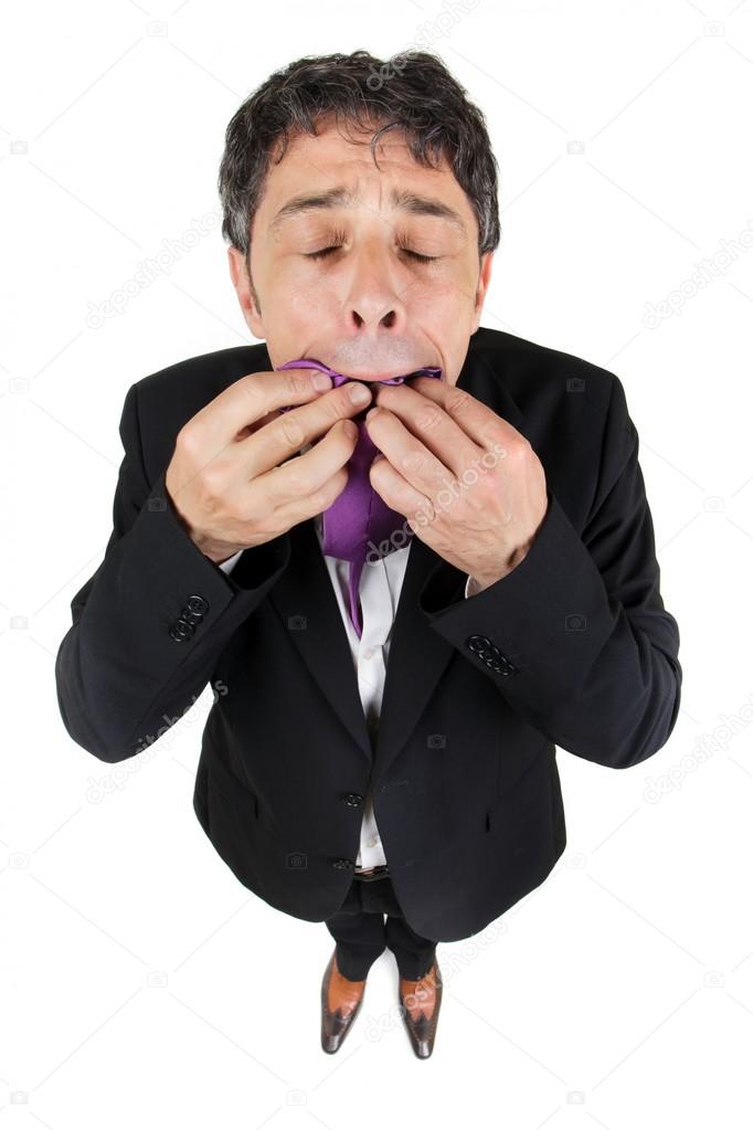 Man eating his tie