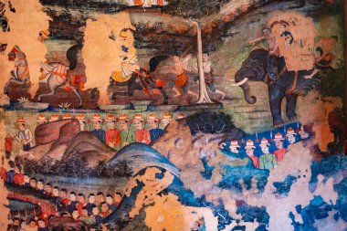 Details of the old wall paintings showing the life of Buddha in the Wat Phra Singh temple, Thailand