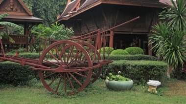 Thai farmer cattle cart decorated at house clipart